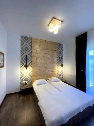 Фото номера Двухместный номер с 1 кроватью Гостевой дом Maramures Guesthouse г. Вишеу-де-Жос 3
