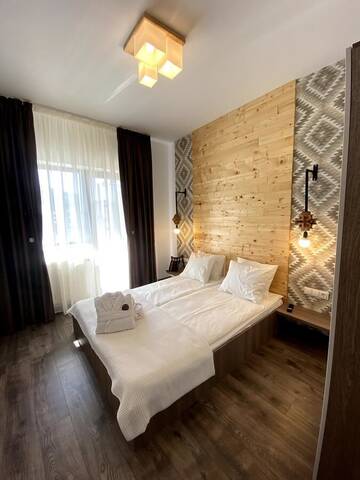 Фото номера Двухместный номер с 1 кроватью Гостевой дом Maramures Guesthouse г. Вишеу-де-Жос 4